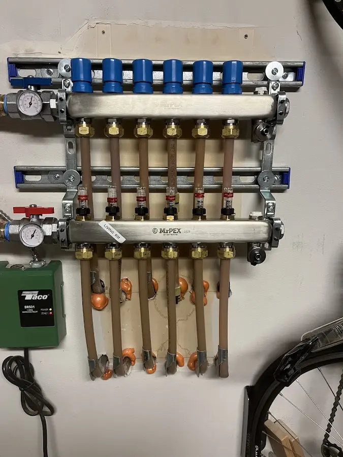 Plumber performing Gas Line Installation at a residential property in Shackle Island